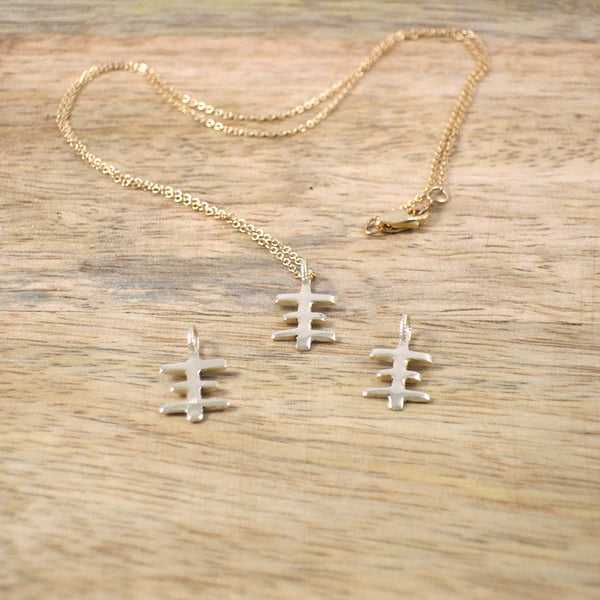 TINY PSYCHIC CROSS PENDANT CAST IN RECYCLED 14K GOLD