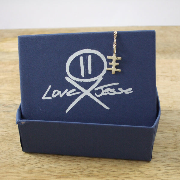 TINY PSYCHIC CROSS PENDANT CAST IN RECYCLED 14K GOLD