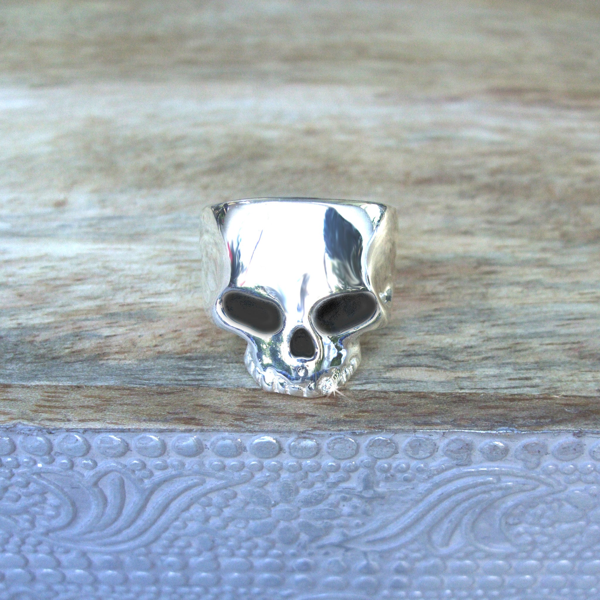 Large Sterling Silver Skull Ring set with .01 diamond