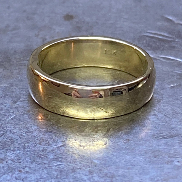 Wedding Band cast in recycled yellow gold.  Approximately 6mm wide